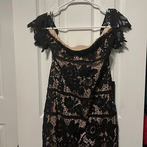Express mid length black dress in a size 6